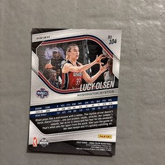 2025 Panini Prizm WNBA – Lucy Olsen #104 Purple Seismic Prizm /175 (RC)