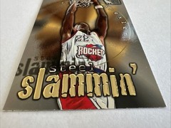1996-97 Fleer Metal – Steel Slammin&rsquo; Clyde Drexler #2 – Rockets