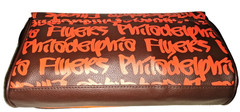 Philadelphia Flyers GRAFFITI CLUTCH PURSE (11 1/2&Prime; x 2 3/8&Prime; x 5 1/2&Prime;) – New
