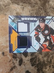2013-14 NHL SPX Cam Fowler Winning Materials Dual Jersey Card #WM-CF