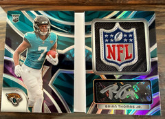 2024 Spectra Brian Thomas Jr NFL SHIELD Rookie Genesis Booklet RPA Nebula 1/2