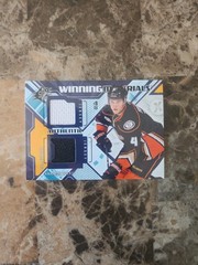 2013-14 NHL SPX Cam Fowler Winning Materials Dual Jersey Card #WM-CF
