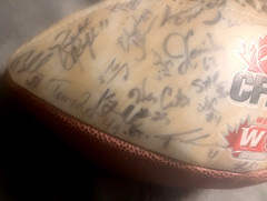 2006 CALGARY STAMPEDERS CFL FOOTBALL AUTOGRAPHED FOOTBALL, 53 AUTOGRAPHS: BURRIS