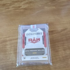 Panini 2024 Prizm Champion Signatures Seth Rollins CS-SFR Red Auto /99