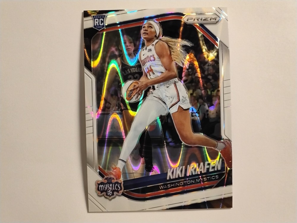 2025 Panini Prizm WNBA #72 Kiki Iriafen (RC) White Seismic Prizm