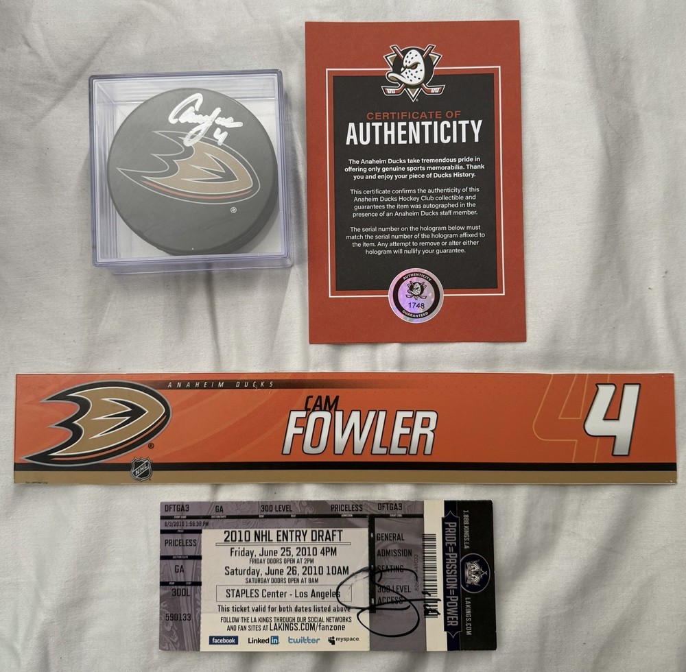 Cam Fowler Signed Entry Draft Ticket. Signed Puck And a Locker Name Plate.