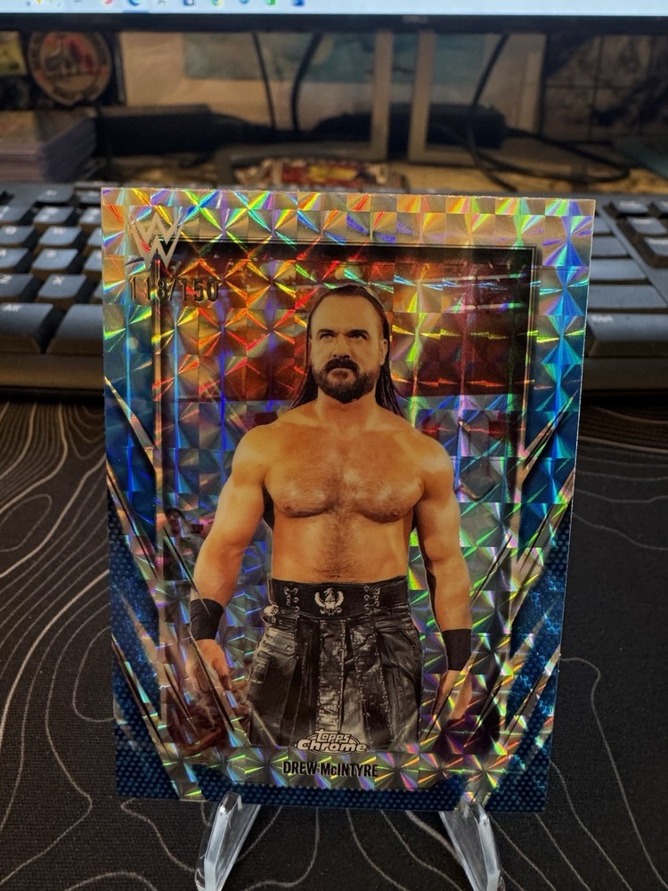 2026 Topps Chrome WWE Drew McIntyre Blue Geometric Refractor #/150
