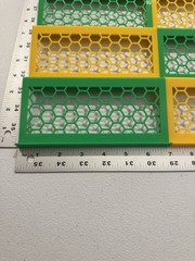 24 Pack Riser For Zion Display Cases Green And Yellow