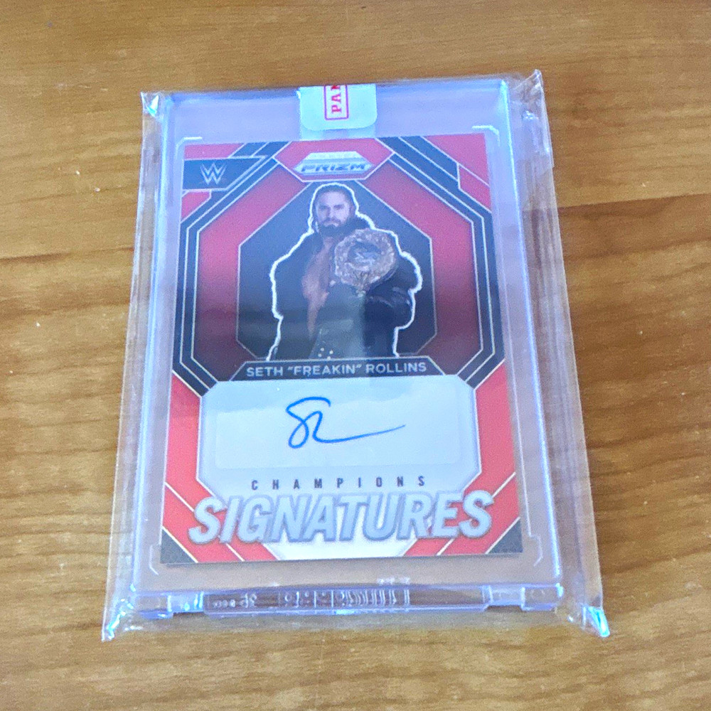 Panini 2024 Prizm Champion Signatures Seth Rollins CS-SFR Red Auto /99