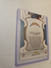 2025 Panini Select – Concourse Justin Herbert #1 Black & Red Shock Prizm