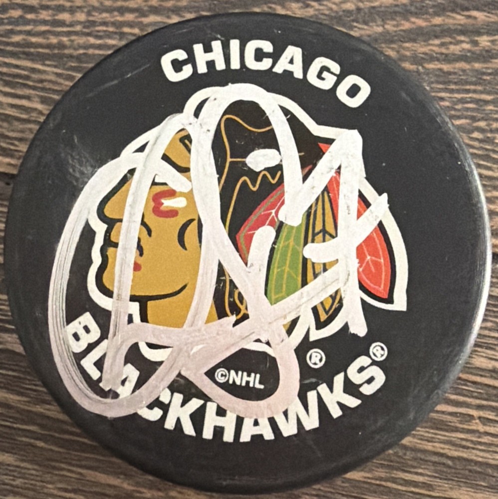 Chris Simon autographed Chicago Blackhawk puck