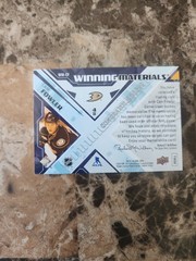 2013-14 NHL SPX Cam Fowler Winning Materials Dual Jersey Card #WM-CF