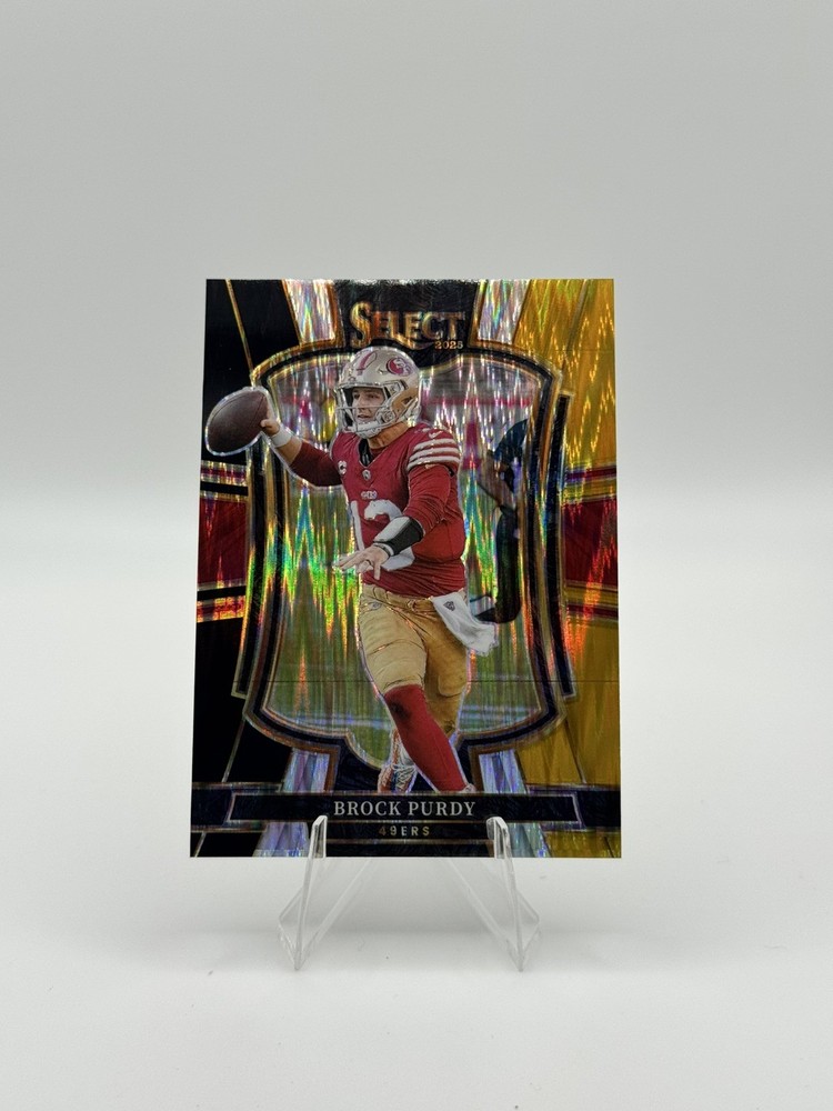 2025 Panini Select Brock Purdy Black and Orange Prizm Shock #117
