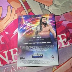 Topps WWE Universe 2025 Roman Reigns International Impact IIM-18 Red Magma 14/25