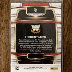 2022 Panini Select WWE – Concourse Undertaker #30 Orange Flash Prizm