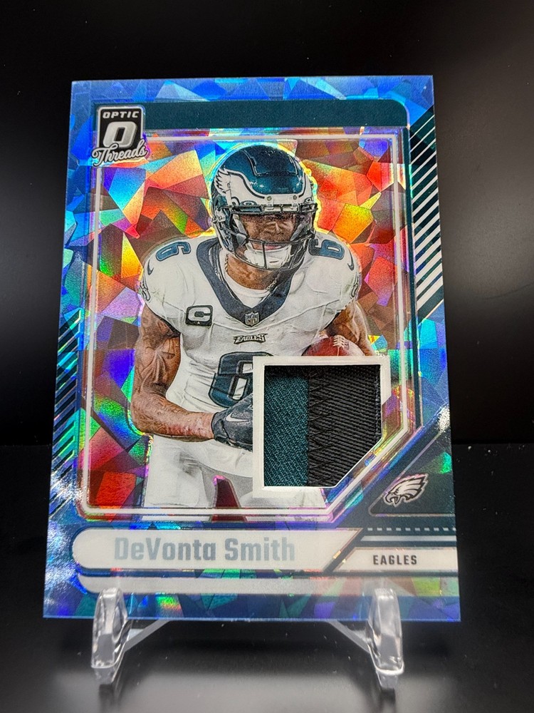 CZ2-661 – 2024 Panini Donruss Optic – DeVonta Smith #DTB-DSH – /49 Blue – Patch