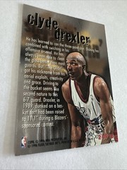 1996-97 Fleer Metal – Steel Slammin&rsquo; Clyde Drexler #2 – Rockets