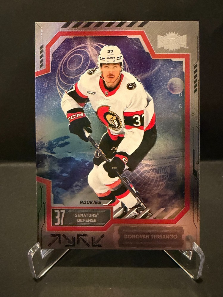 Donovan Sebrango – 2025-26 Skybox Metal Universe Hockey Rookies #139- Senators